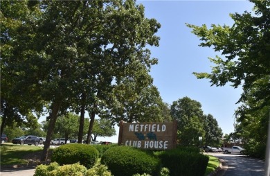 Stunning home that is handicap accessible in a rare much desired on Bella Vista - Metfield Golf Complex and Country Club in Arkansas - for sale on GolfHomes.com, golf home, golf lot