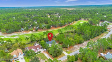Welcome to your new home nestled on a wooded lot on the 13th on The Lakes Country Club in North Carolina - for sale on GolfHomes.com, golf home, golf lot