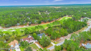 Welcome to your new home nestled on a wooded lot on the 13th on The Lakes Country Club in North Carolina - for sale on GolfHomes.com, golf home, golf lot