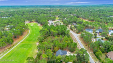 Welcome to your new home nestled on a wooded lot on the 13th on The Lakes Country Club in North Carolina - for sale on GolfHomes.com, golf home, golf lot