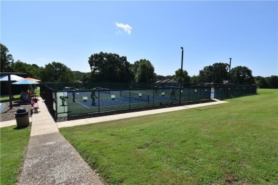 Stunning home that is handicap accessible in a rare much desired on Bella Vista - Metfield Golf Complex and Country Club in Arkansas - for sale on GolfHomes.com, golf home, golf lot