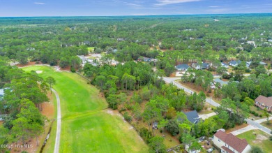 Welcome to your new home nestled on a wooded lot on the 13th on The Lakes Country Club in North Carolina - for sale on GolfHomes.com, golf home, golf lot