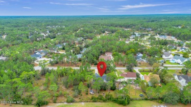 Welcome to your new home nestled on a wooded lot on the 13th on The Lakes Country Club in North Carolina - for sale on GolfHomes.com, golf home, golf lot