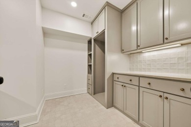 Experience the allure of a FULLY REMODELED home, transformed on Reynolds Lake Oconee - The Landing in Georgia - for sale on GolfHomes.com, golf home, golf lot