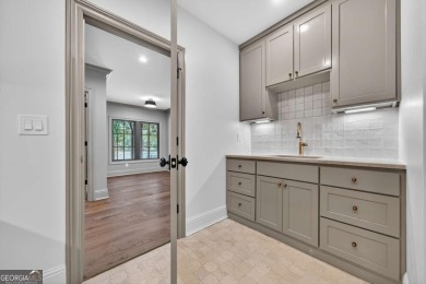 Experience the allure of a FULLY REMODELED home, transformed on Reynolds Lake Oconee - The Landing in Georgia - for sale on GolfHomes.com, golf home, golf lot