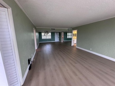 Enjoy breathtaking views of the golf course from your screened on Palm-Aire Country Club and Resort - The Oaks in Florida - for sale on GolfHomes.com, golf home, golf lot