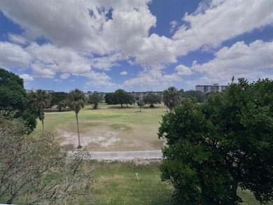 Enjoy breathtaking views of the golf course from your screened on Palm-Aire Country Club and Resort - The Oaks in Florida - for sale on GolfHomes.com, golf home, golf lot