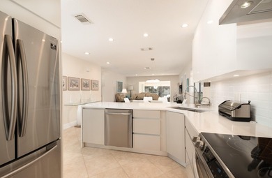 Immaculate, move-in-ready corner residence offering 3 bedrooms on Boca Lago Golf and Country Club in Florida - for sale on GolfHomes.com, golf home, golf lot