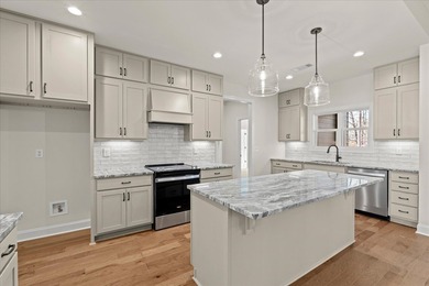 This stunning, brand-new home is officially complete, move-in on Fairfield Plantation Golf and Country Club in Georgia - for sale on GolfHomes.com, golf home, golf lot