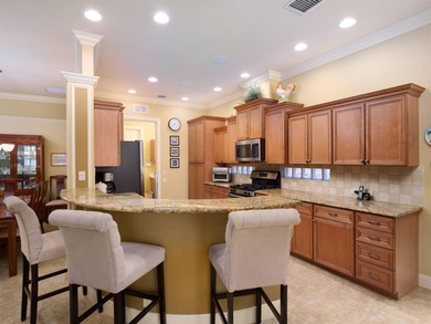 This beautifully maintained 3 bedroom, 2 bath golf course pool on Ibis Golf and Country Club in Florida - for sale on GolfHomes.com, golf home, golf lot