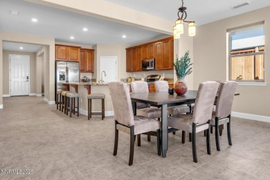 Enjoy breathtaking mountain and valley views from this on Somersett Country Club in Nevada - for sale on GolfHomes.com, golf home, golf lot