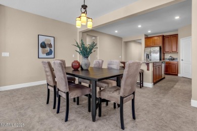 Enjoy breathtaking mountain and valley views from this on Somersett Country Club in Nevada - for sale on GolfHomes.com, golf home, golf lot