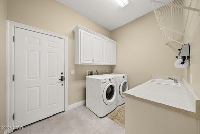 Enjoy single-story living in the prestigious Bay Point community on Bay Point Resort Golf Club in Florida - for sale on GolfHomes.com, golf home, golf lot