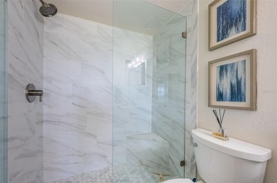 Tastefully remodeled in 2022 with high-end finishes, this ground on Isla Del Sol Yacht and Country Club in Florida - for sale on GolfHomes.com, golf home, golf lot