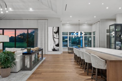 Nestled within the exclusive, gated golf community of Palm Beach on  in Florida - for sale on GolfHomes.com, golf home, golf lot