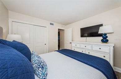 Tastefully remodeled in 2022 with high-end finishes, this ground on Isla Del Sol Yacht and Country Club in Florida - for sale on GolfHomes.com, golf home, golf lot