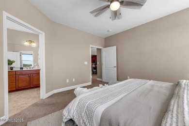 Enjoy breathtaking mountain and valley views from this on Somersett Country Club in Nevada - for sale on GolfHomes.com, golf home, golf lot