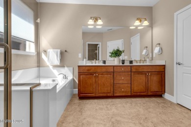 Enjoy breathtaking mountain and valley views from this on Somersett Country Club in Nevada - for sale on GolfHomes.com, golf home, golf lot