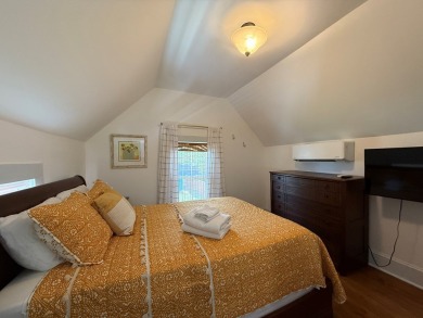 SEAS THE BAY! Coastal beach cottage, originally built in 1920 on Bay Creek Golf Club in Virginia - for sale on GolfHomes.com, golf home, golf lot