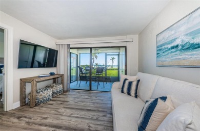Tastefully remodeled in 2022 with high-end finishes, this ground on Isla Del Sol Yacht and Country Club in Florida - for sale on GolfHomes.com, golf home, golf lot