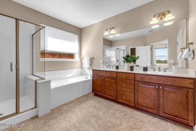 Enjoy breathtaking mountain and valley views from this on Somersett Country Club in Nevada - for sale on GolfHomes.com, golf home, golf lot