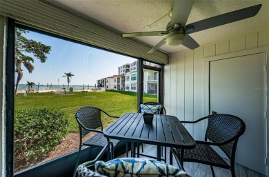 Tastefully remodeled in 2022 with high-end finishes, this ground on Isla Del Sol Yacht and Country Club in Florida - for sale on GolfHomes.com, golf home, golf lot