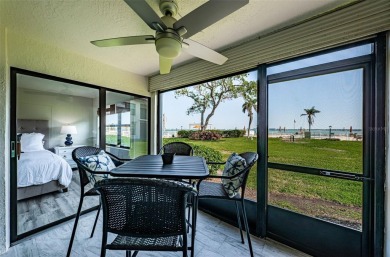 Tastefully remodeled in 2022 with high-end finishes, this ground on Isla Del Sol Yacht and Country Club in Florida - for sale on GolfHomes.com, golf home, golf lot