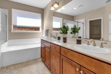 Enjoy breathtaking mountain and valley views from this on Somersett Country Club in Nevada - for sale on GolfHomes.com, golf home, golf lot