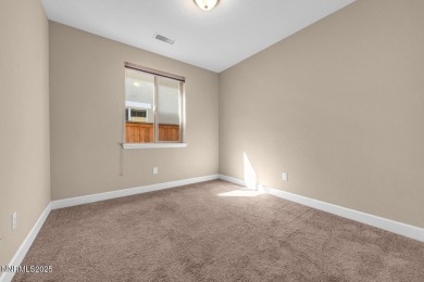 Enjoy breathtaking mountain and valley views from this on Somersett Country Club in Nevada - for sale on GolfHomes.com, golf home, golf lot