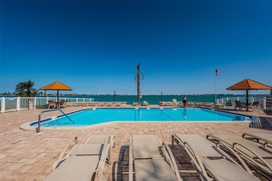 Tastefully remodeled in 2022 with high-end finishes, this ground on Isla Del Sol Yacht and Country Club in Florida - for sale on GolfHomes.com, golf home, golf lot
