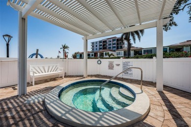Tastefully remodeled in 2022 with high-end finishes, this ground on Isla Del Sol Yacht and Country Club in Florida - for sale on GolfHomes.com, golf home, golf lot