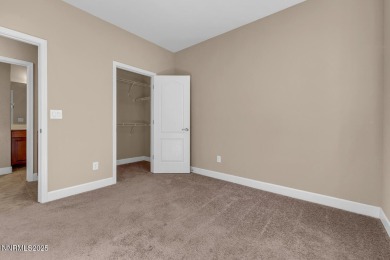 Enjoy breathtaking mountain and valley views from this on Somersett Country Club in Nevada - for sale on GolfHomes.com, golf home, golf lot