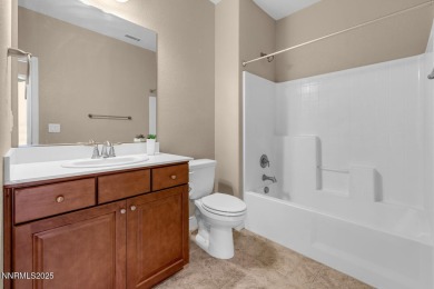 Enjoy breathtaking mountain and valley views from this on Somersett Country Club in Nevada - for sale on GolfHomes.com, golf home, golf lot