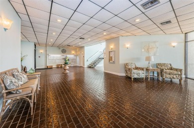 Tastefully remodeled in 2022 with high-end finishes, this ground on Isla Del Sol Yacht and Country Club in Florida - for sale on GolfHomes.com, golf home, golf lot