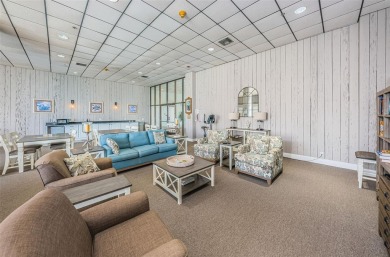 Tastefully remodeled in 2022 with high-end finishes, this ground on Isla Del Sol Yacht and Country Club in Florida - for sale on GolfHomes.com, golf home, golf lot