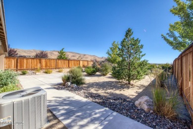 Enjoy breathtaking mountain and valley views from this on Somersett Country Club in Nevada - for sale on GolfHomes.com, golf home, golf lot