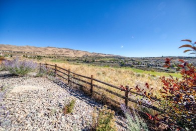 Enjoy breathtaking mountain and valley views from this on Somersett Country Club in Nevada - for sale on GolfHomes.com, golf home, golf lot
