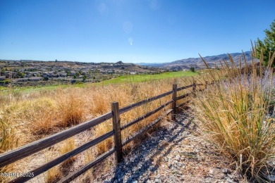Enjoy breathtaking mountain and valley views from this on Somersett Country Club in Nevada - for sale on GolfHomes.com, golf home, golf lot