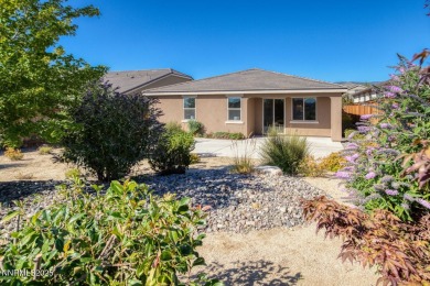 Enjoy breathtaking mountain and valley views from this on Somersett Country Club in Nevada - for sale on GolfHomes.com, golf home, golf lot