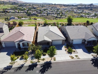 Enjoy breathtaking mountain and valley views from this on Somersett Country Club in Nevada - for sale on GolfHomes.com, golf home, golf lot