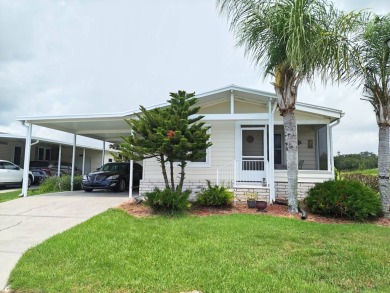 THIS IS A 2005 PALM HARBOR TRIPLE WIDE WITH OVER 1400 FEET OF on Southport Springs Golf Club in Florida - for sale on GolfHomes.com, golf home, golf lot