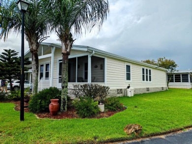 THIS IS A 2005 PALM HARBOR TRIPLE WIDE WITH OVER 1400 FEET OF on Southport Springs Golf Club in Florida - for sale on GolfHomes.com, golf home, golf lot