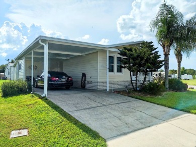THIS IS A 2005 PALM HARBOR TRIPLE WIDE WITH OVER 1400 FEET OF on Southport Springs Golf Club in Florida - for sale on GolfHomes.com, golf home, golf lot