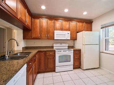 Stunning golf & lake views over Hole 4 of the West Course set on Old Marsh Golf Club in Florida - for sale on GolfHomes.com, golf home, golf lot