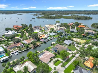 Step into your own slice of waterfront paradise-this four on Plantation Inn and Golf Resort  in Florida - for sale on GolfHomes.com, golf home, golf lot