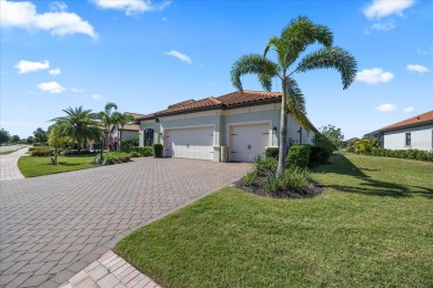 Discover the perfect blend of comfort, elegance, and Florida on Ritz-Carlton Members Golf Club in Florida - for sale on GolfHomes.com, golf home, golf lot