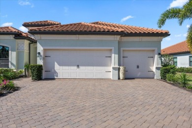 Discover the perfect blend of comfort, elegance, and Florida on Ritz-Carlton Members Golf Club in Florida - for sale on GolfHomes.com, golf home, golf lot