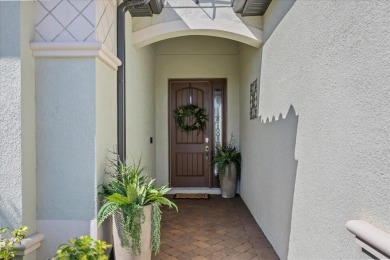 Discover the perfect blend of comfort, elegance, and Florida on Ritz-Carlton Members Golf Club in Florida - for sale on GolfHomes.com, golf home, golf lot