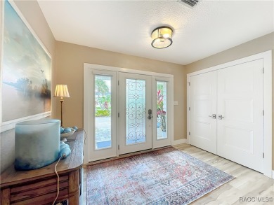 Step into your own slice of waterfront paradise-this four on Plantation Inn and Golf Resort  in Florida - for sale on GolfHomes.com, golf home, golf lot