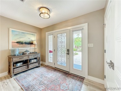 Step into your own slice of waterfront paradise-this four on Plantation Inn and Golf Resort  in Florida - for sale on GolfHomes.com, golf home, golf lot